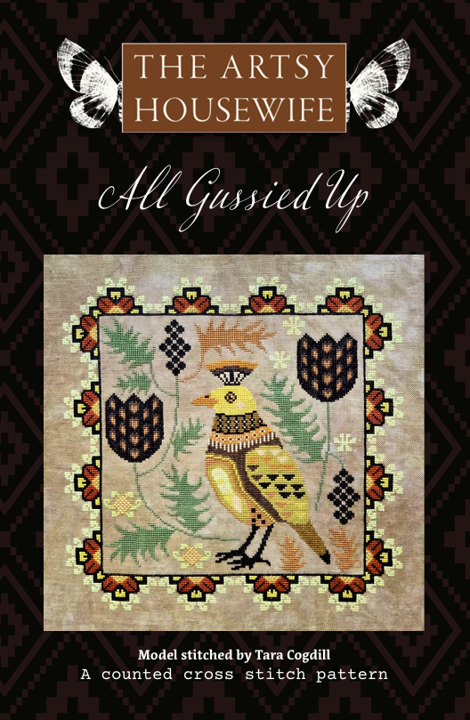 Cover of 'All Gussied Up' by The Artsy Housewife with a cross-stitch pattern of a bird and leaves.
