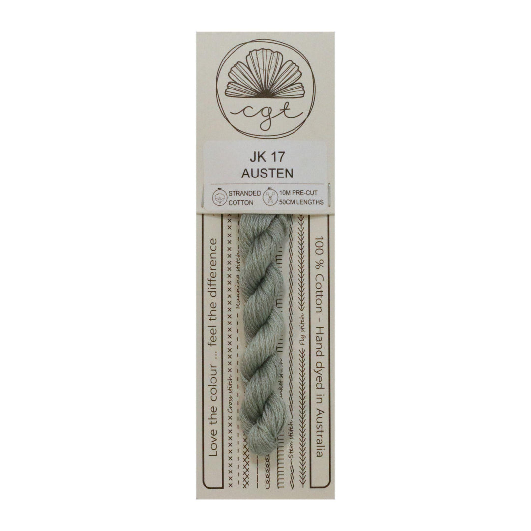A skein of 'Austen' color cross stitch and embroidery floss, packaged on a card with branding and product information.