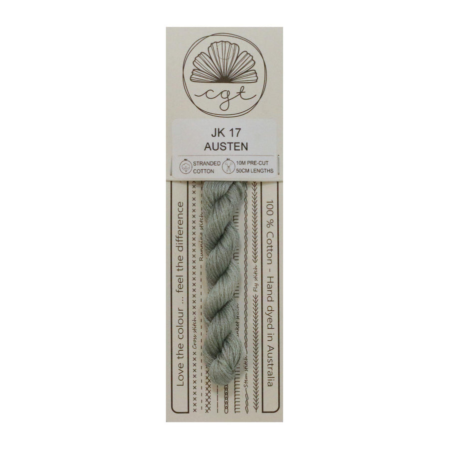 A skein of 'Austen' color cross stitch and embroidery floss, packaged on a card with branding and product information.