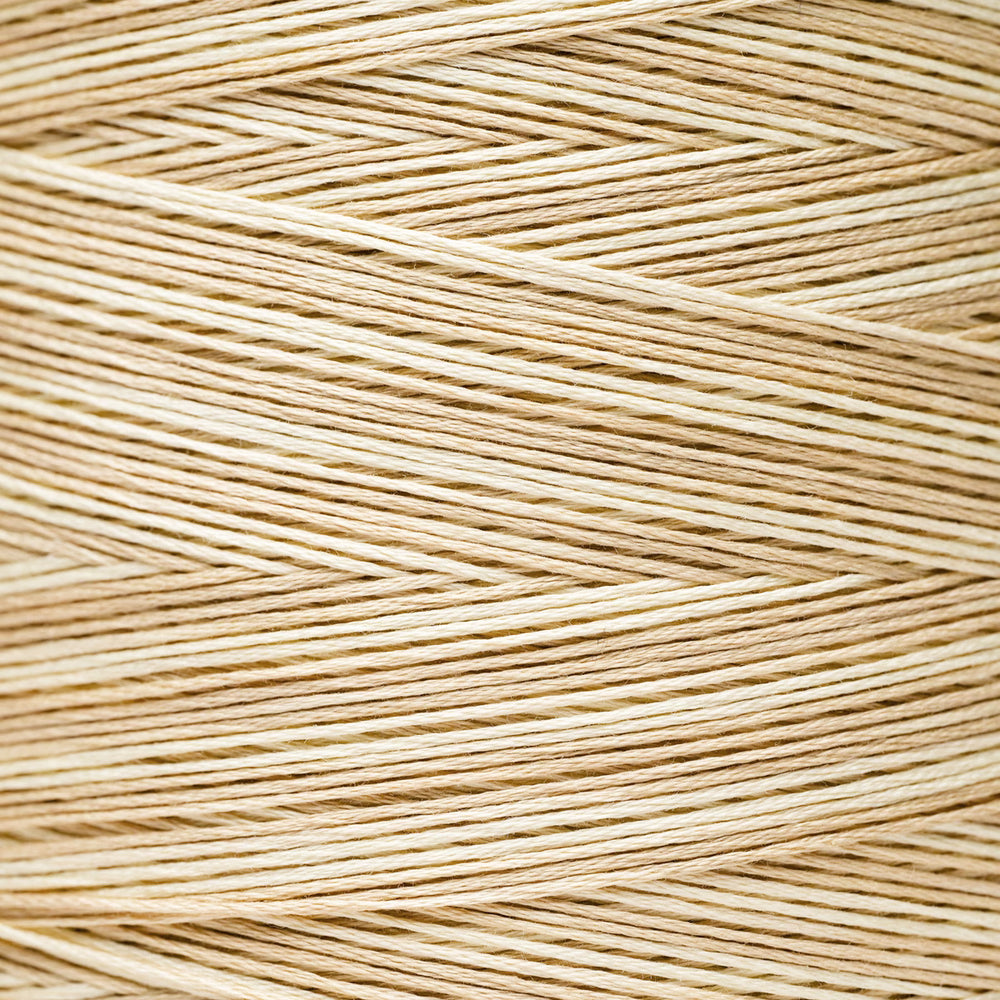 A close-up texture shot of light beige braided cord or thread, showing the fine strands woven in a diagonal chevron pattern.