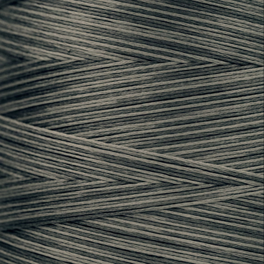 Close-up of gray thread strands