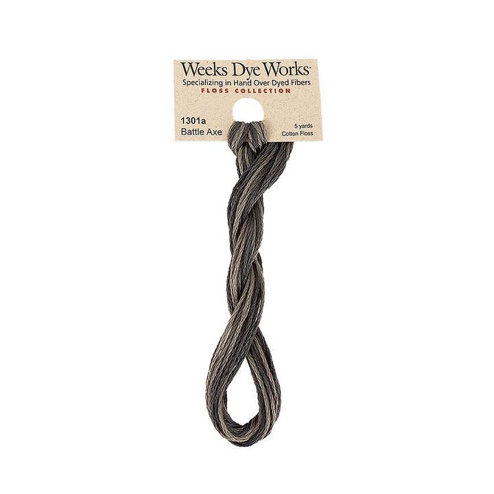 A single bundle of Weeks Dye Works Faux Collection hard-dyed fiber yarn in the shade Battle Axe, attached to its original paper header card, shown against a plain white background.