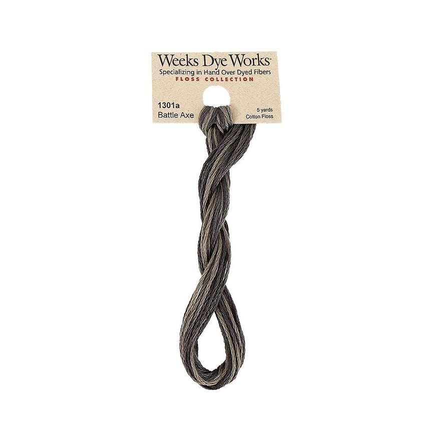 A single bundle of Weeks Dye Works Faux Collection hard-dyed fiber yarn in the shade Battle Axe, attached to its original paper header card, shown against a plain white background.