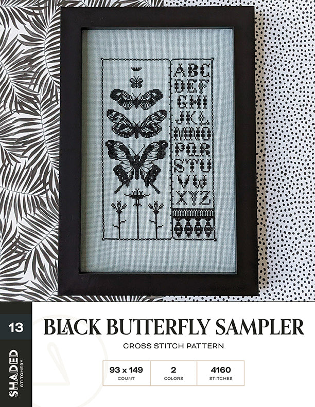 Black butterfly sampler cross stitch pattern with text on a textured background