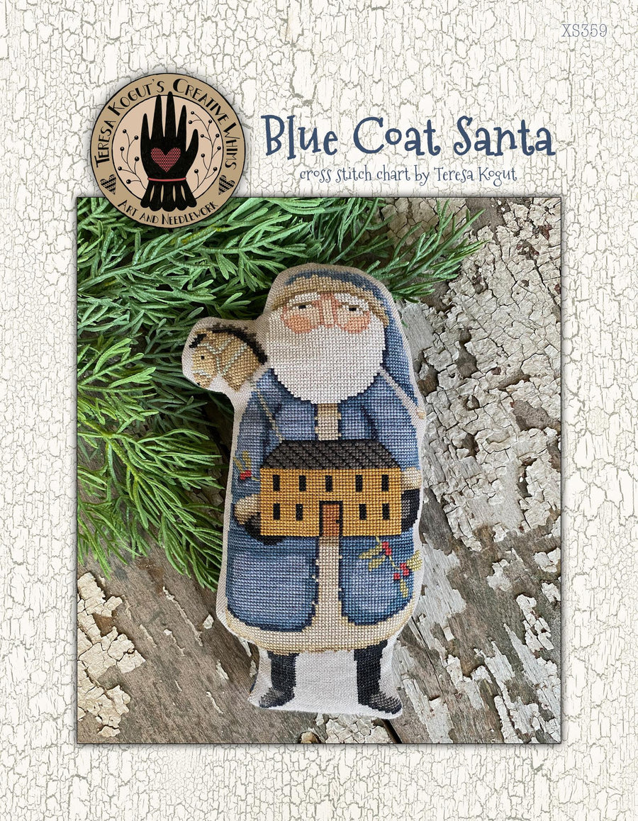 Cross stitch chart of a Santa Claus figure wearing a blue coat with greenery and wooden background.