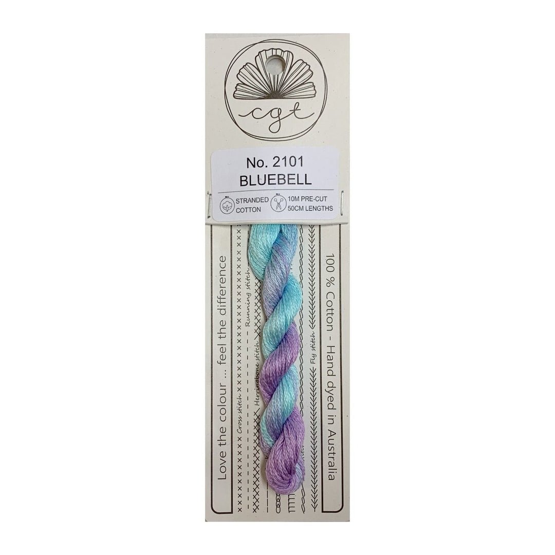 Packaging of Cottage Garden Threads Bluebell No. 2111, featuring a pre-cut skein of multicolored floss, with details on the product's characteristics and environmental friendliness.