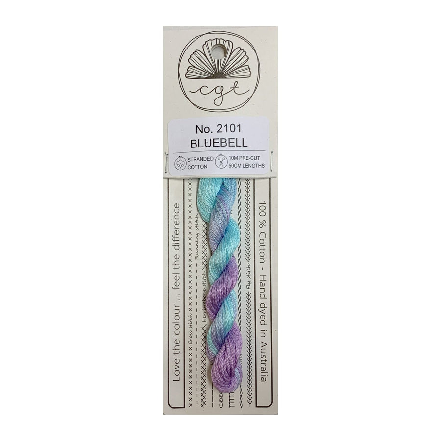 Packaging of Cottage Garden Threads Bluebell No. 2111, featuring a pre-cut skein of multicolored floss, with details on the product's characteristics and environmental friendliness.