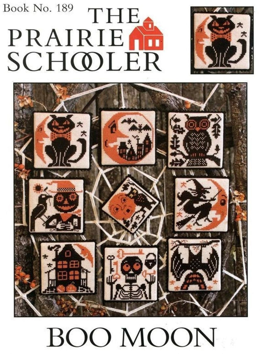 Cover of 'The Prairie Schooler Boo Moon' with Halloween-themed cross-stitch patterns.