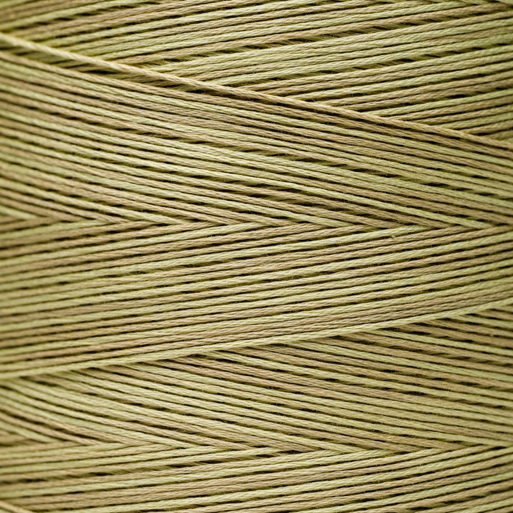 A close-up texture shot of light tan or beige braided thread wound in a herringbone pattern.