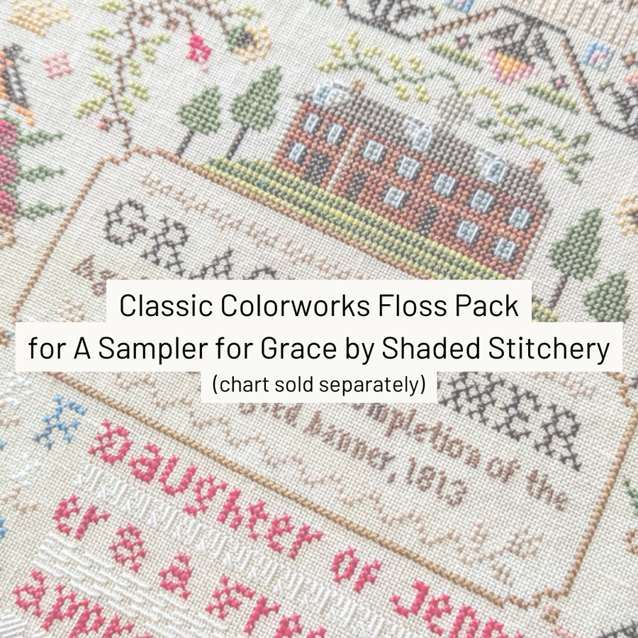Cross-stitched sampler with text and a building design, featuring 'Classic Colorworks Floss Pack' by Shaded Stitchery.