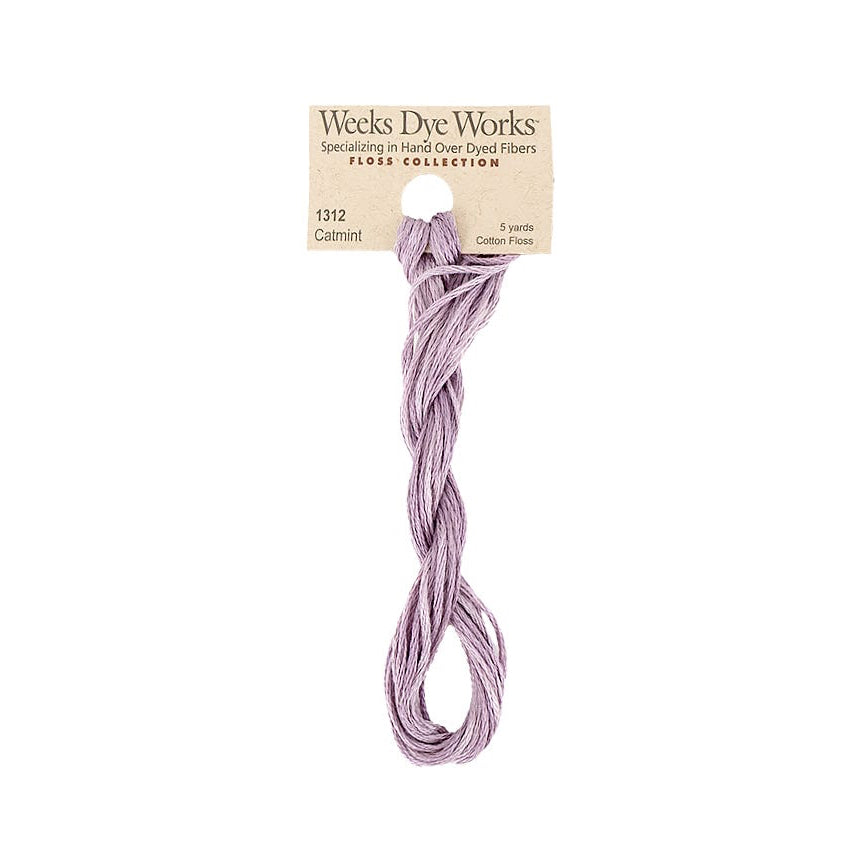 Purple thread skein with Weeks Dye Works label on a white background