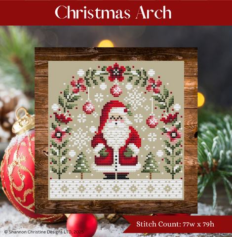 A Christmas-themed cross-stitch pattern preview titled 'Christmas Arch' showing a stitched design of Santa Claus framed by a green wreath with red berries and white snowflakes, set on a wood-textured square with festive blurred holiday decorations around it.