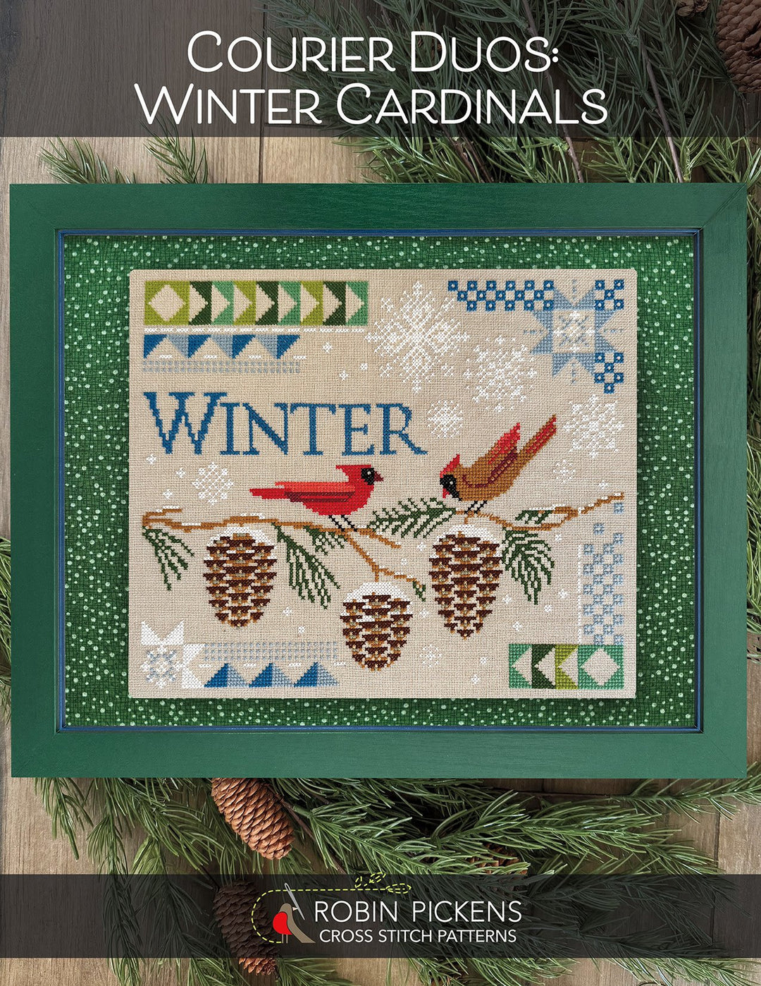 Cross stitch pattern for 'Winter Cardinals' with red cardinals on a branch, framed by greenery.