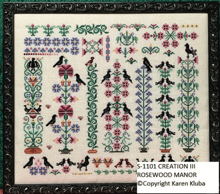 Decorative cross-stitch pattern with birds and flowers, framed by a decorative border.