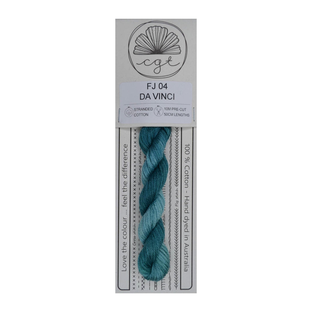 A skein of blue Cottage Garden Threads pre-cut 6 Strand Hand-Dyed 100% cotton cross stitch and embroidery floss, packaged on a card.