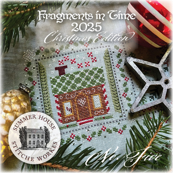 Fragments in Time 2025 Christmas Edition cross-stitch kit with decorative elements on a textured background.