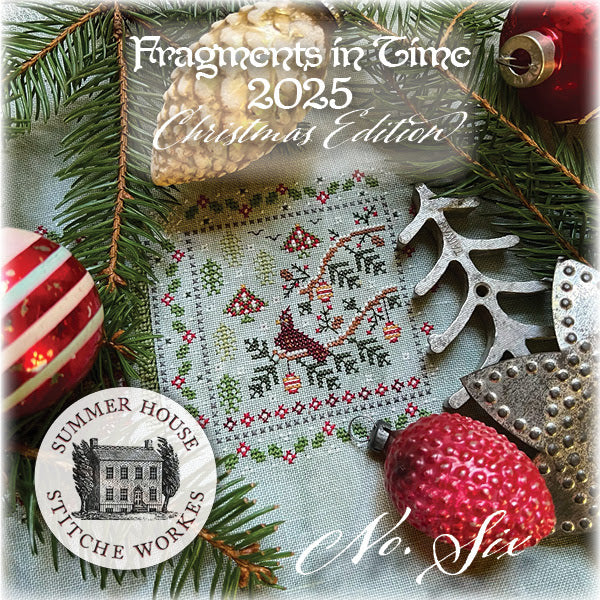 Fragments in Time 2025 Christmas Edition book cover with embroidery design and festive decorations.