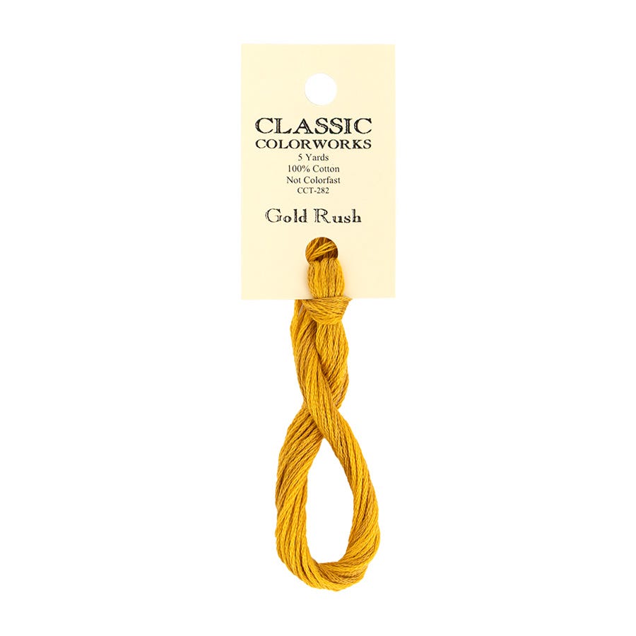 Yellow yarn with a 'Gold Rush' label on a white background