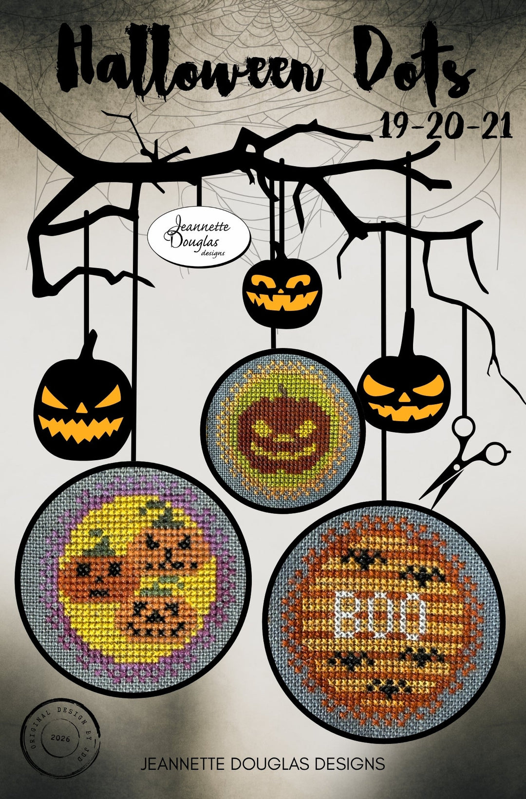 Halloween-themed cross-stitch pattern cover titled 'Halloween Dots 19-20-21' by Jeannette Douglas Designs, showing three circular stitched pumpkin designs hanging from black branches against a gray background.