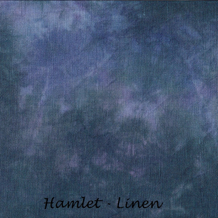 A close-up fabric texture swatch in a mottled blue and purple linen-like pattern, with the text 'Hamlet - Linen' at the bottom.