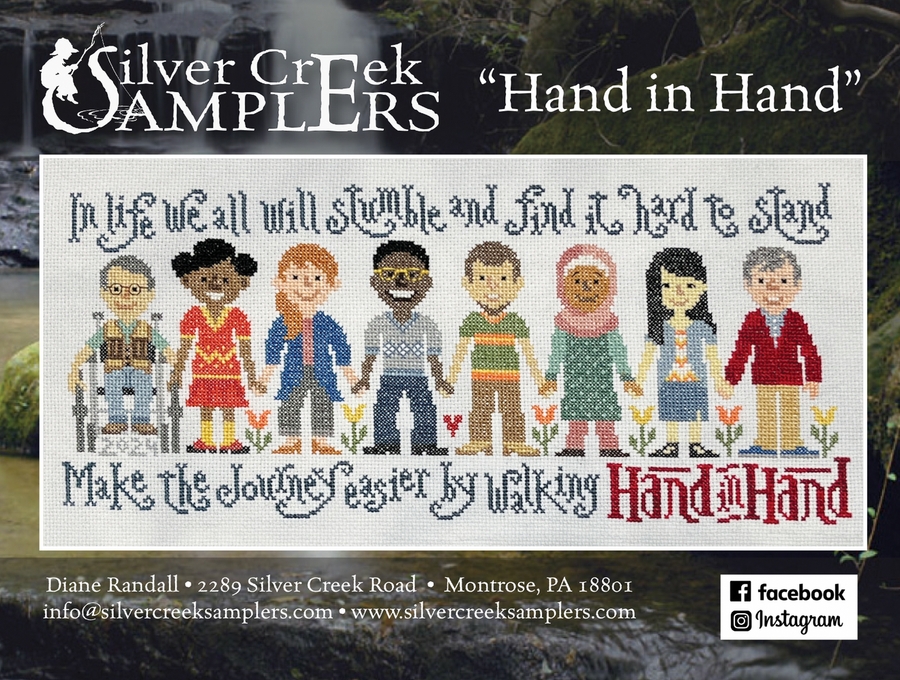 Advertisement for Silver Creek Samplers featuring a cross-stitch design of diverse people holding hands with text.