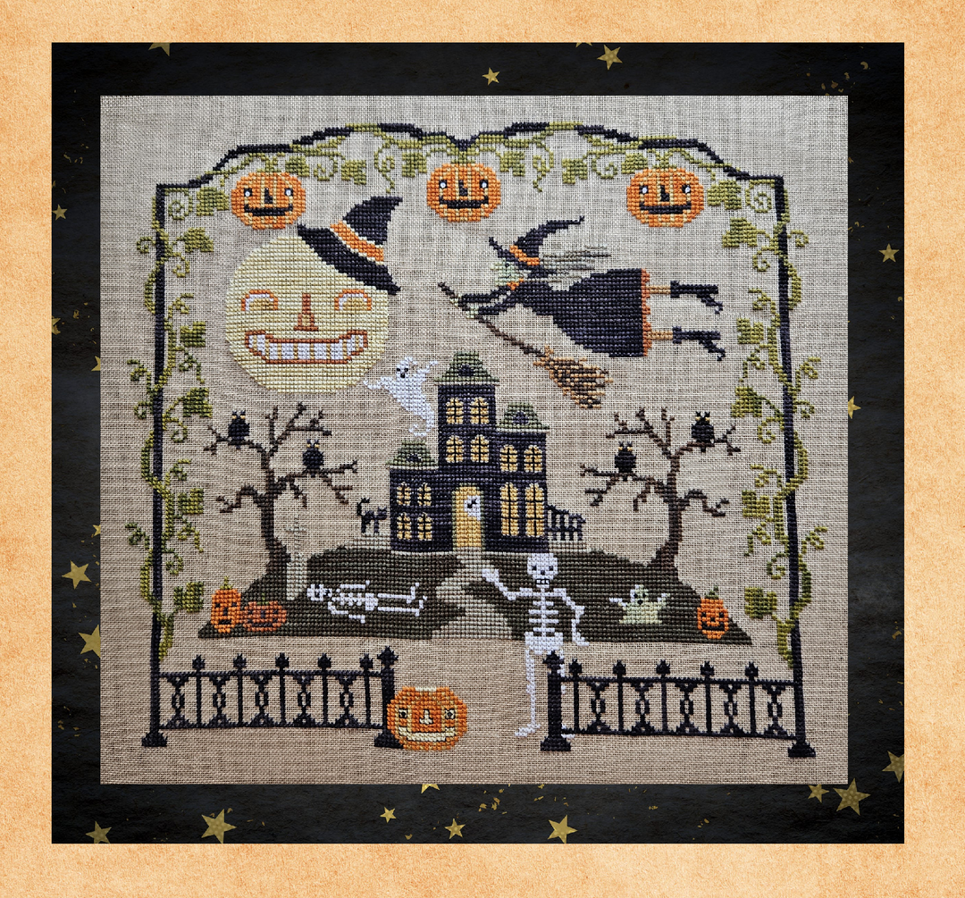 A square cross-stitch or needlework design featuring a Halloween scene with a haunted house, skeleton, witch on broomstick, jack-o'-lanterns, moon face, and black fence, centered on a beige fabric ground with a dark border and star accents.