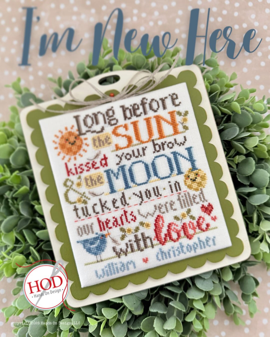 Decorative cross-stitch design with text on a green leafy background, featuring the brand 'HOD'.