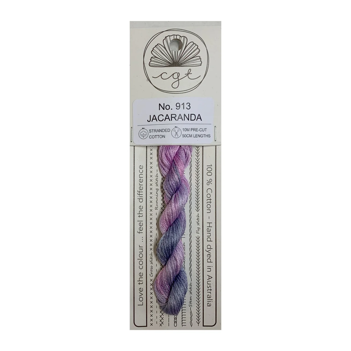 Packaged purple thread with a label indicating color 'Jacaranda' and brand CGT'.