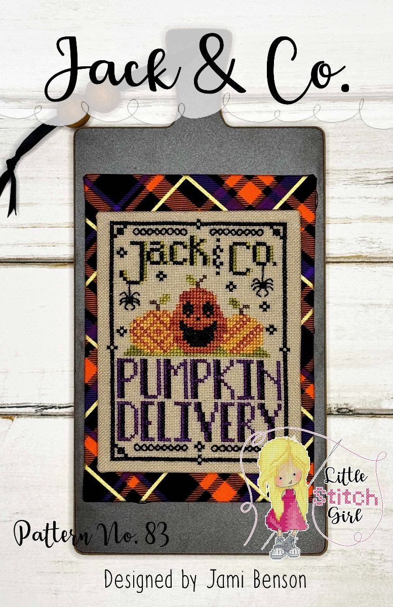 Cross-stitch pattern for 'Jack & Co. Pumpkin Delivery' with plaid border on a wooden background.