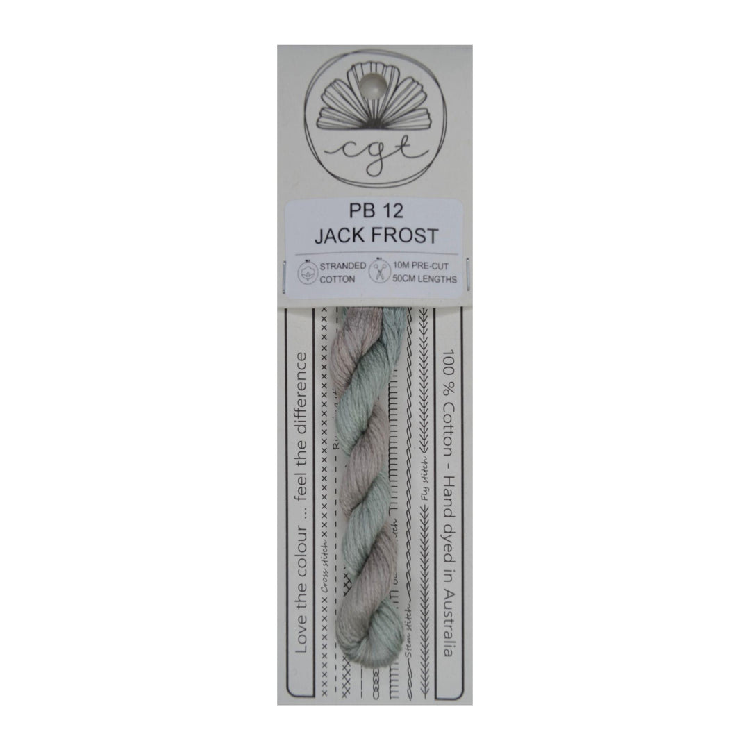 A skein of Jack Frost pre-cut 6 Strand Hand-Dyed 100% cotton cross stitch and embroidery floss, packaged on a card with product information.