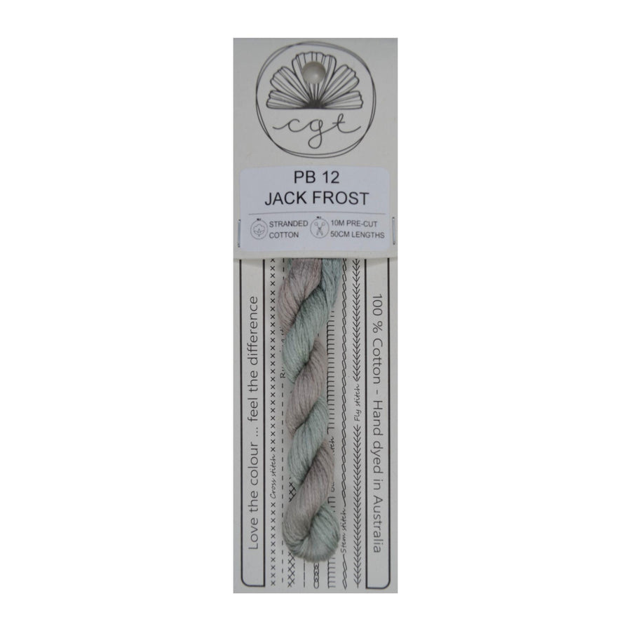 A skein of Jack Frost pre-cut 6 Strand Hand-Dyed 100% cotton cross stitch and embroidery floss, packaged on a card with product information.