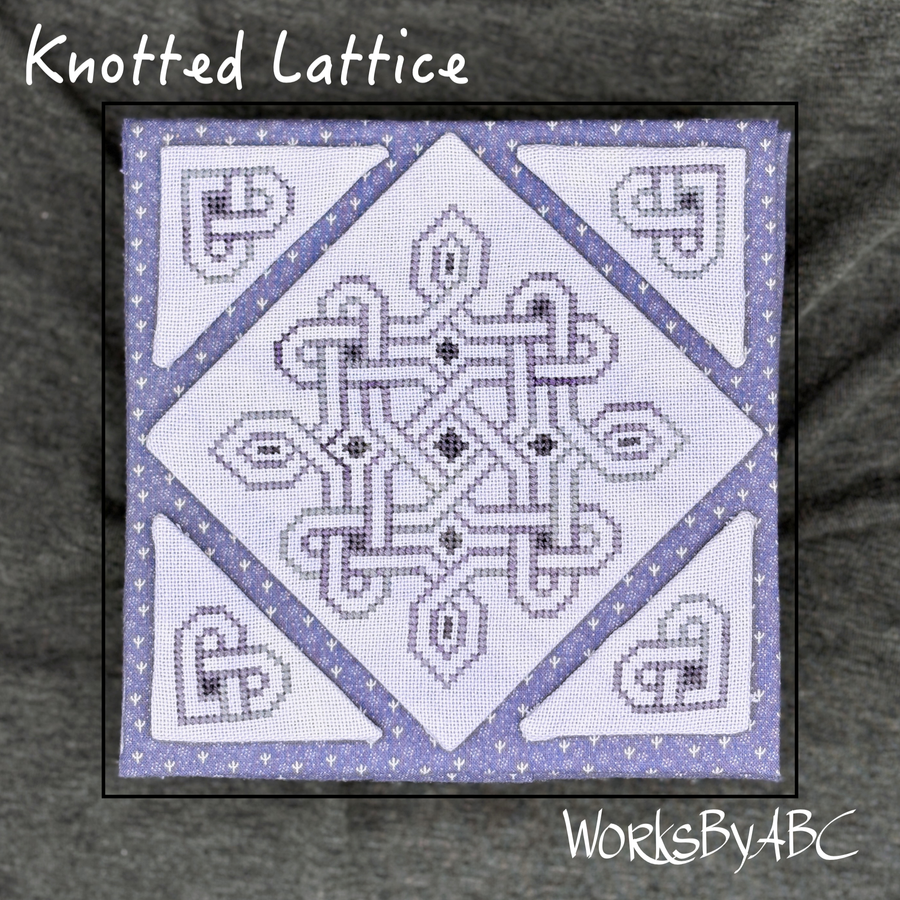 A square cross-stitch pattern titled 'Knotted Lattice' featuring a Celtic knot design in lavender and white on white Aida fabric, presented on a dark gray textured background with 'WorksByABC' branding.