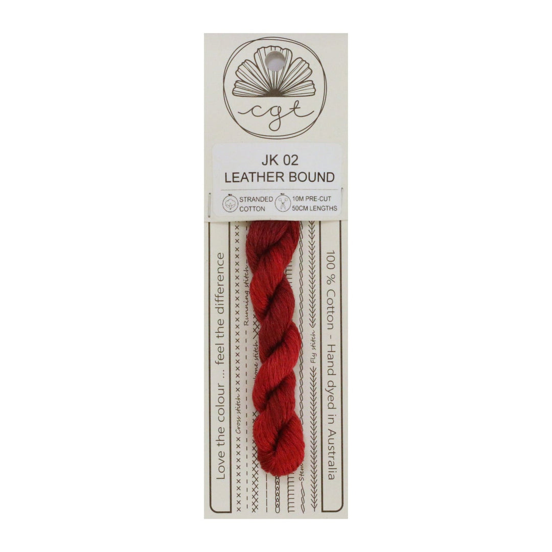 A skein of red pre-cut 6 strand hand-dyed 100% cotton cross stitch and embroidery floss, labeled with the brand Cottage Garden Threads and the product information.