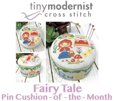 Cross-stitched fairy tale-themed pin cushion with 'tinymodernist cross stitch' branding.