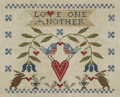 Decorative needlepoint design with birds, hearts, and the phrase 'Love One Another' on a beige background.