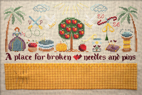 Cross-stitched design with various elements and text on a textured fabric background
