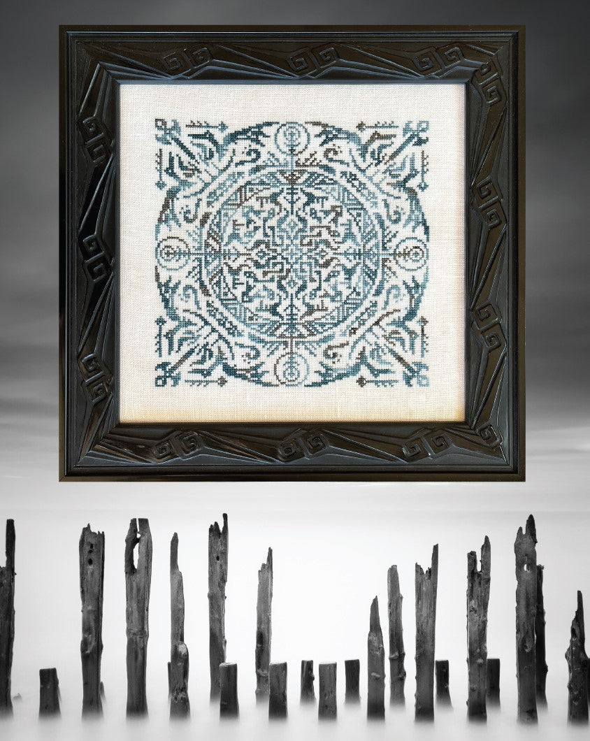 Decorative framed artwork with a geometric design on a white background, below which are wooden stakes.