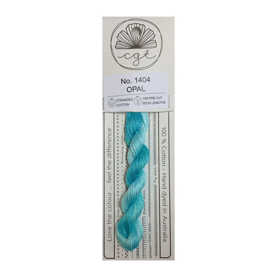 A skein of Cottage Garden Threads pre-cut 6 Strand Hand-Dyed 100% cotton cross stitch and embroidery floss in color Opal, packaged on a card with product information.