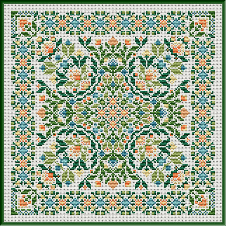 A detailed image of a embroidered peach and teal blooms pattern with greenery, on a green background, charted with DMC.