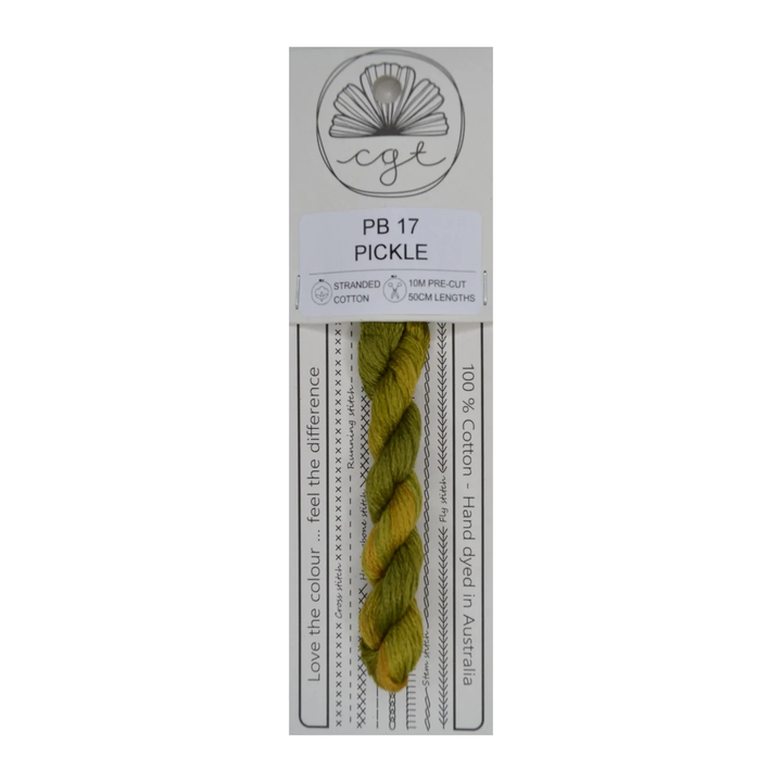 A card package of Cottage Garden Threads with a pre-cut 6 strand hand-dyed 100% cotton cross stitch and embroidery floss in green color.