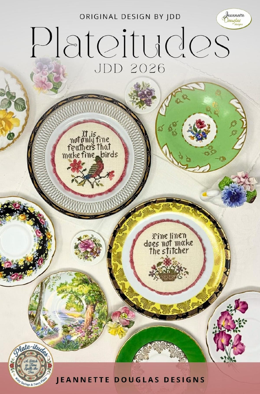 Cover of the Plateitudes JDD 2026 journal or craft book, featuring a collage of decorative vintage-style plates with floral and bird illustrations on a cream background. The title 'Plateitudes' is prominently displayed at the top, with 'Original Design by JDD' and 'Jeannette Douglas Designs' visible.