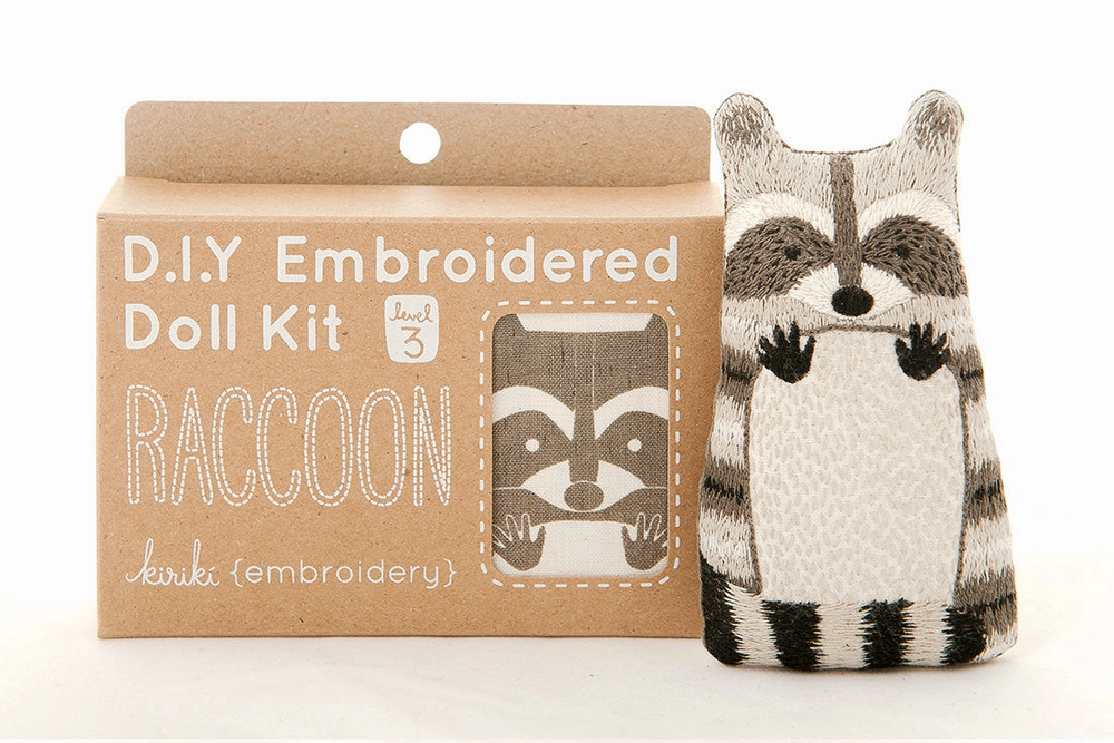 D.I.Y. Embroidered Doll Kit with raccoon design on a white background