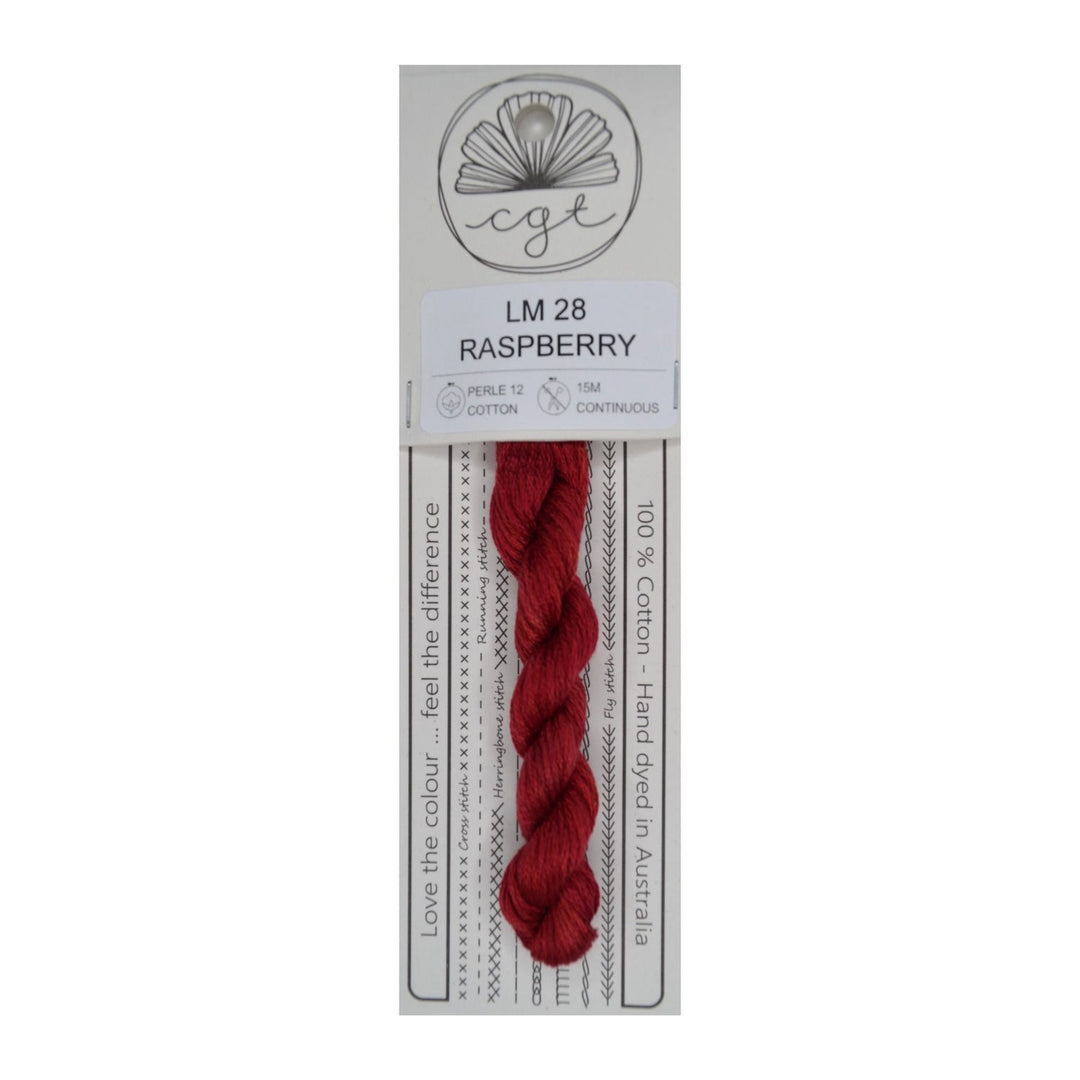 A skein of red Cottage Garden Threads pre-cut 6 Strand Hand-Dyed 100% cotton cross stitch and embroidery floss, packaged on a card with product information.