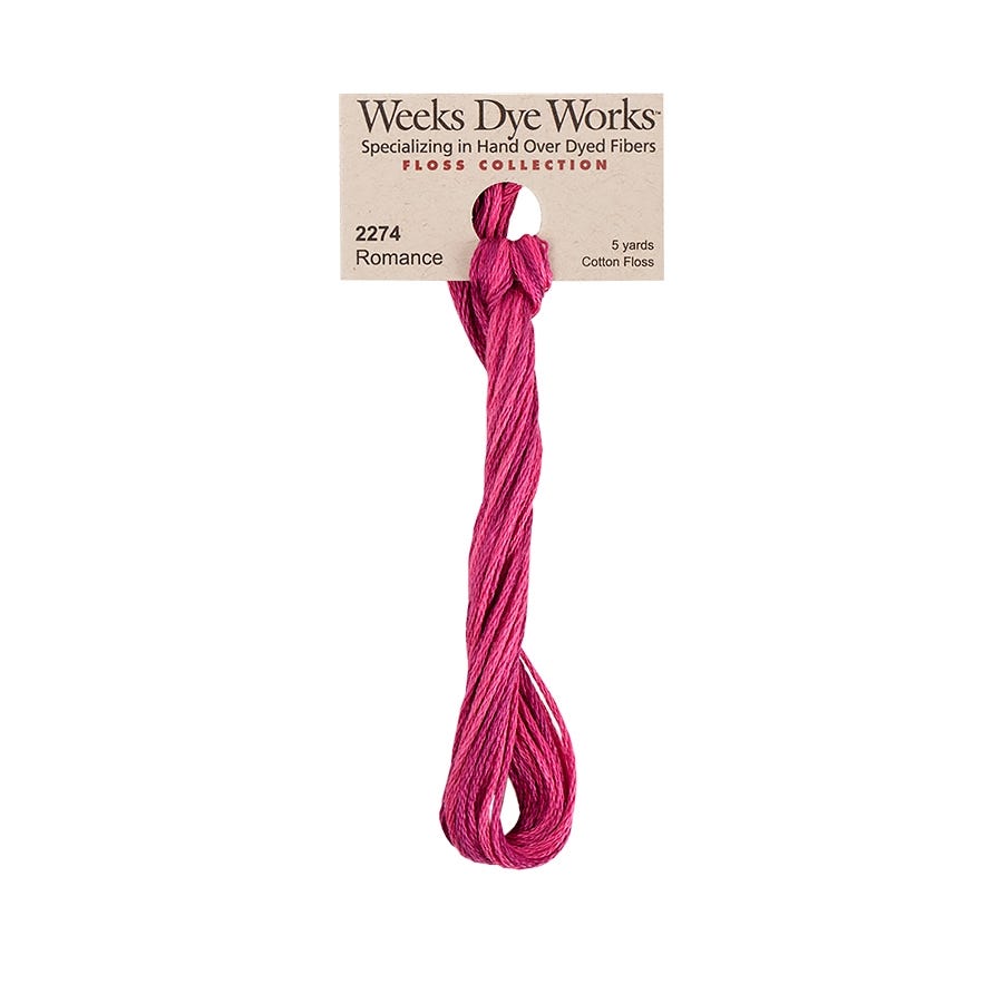 A single bundle of Weeks Dye Works 'Romance' cotton embroidery floss in a vibrant magenta pink, hanging from its original paper label on a plain white background.
