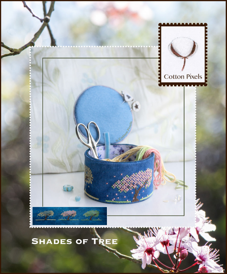 Blue sewing kit with scissors and thread on a white background, featuring the Cotton Pixels brand.