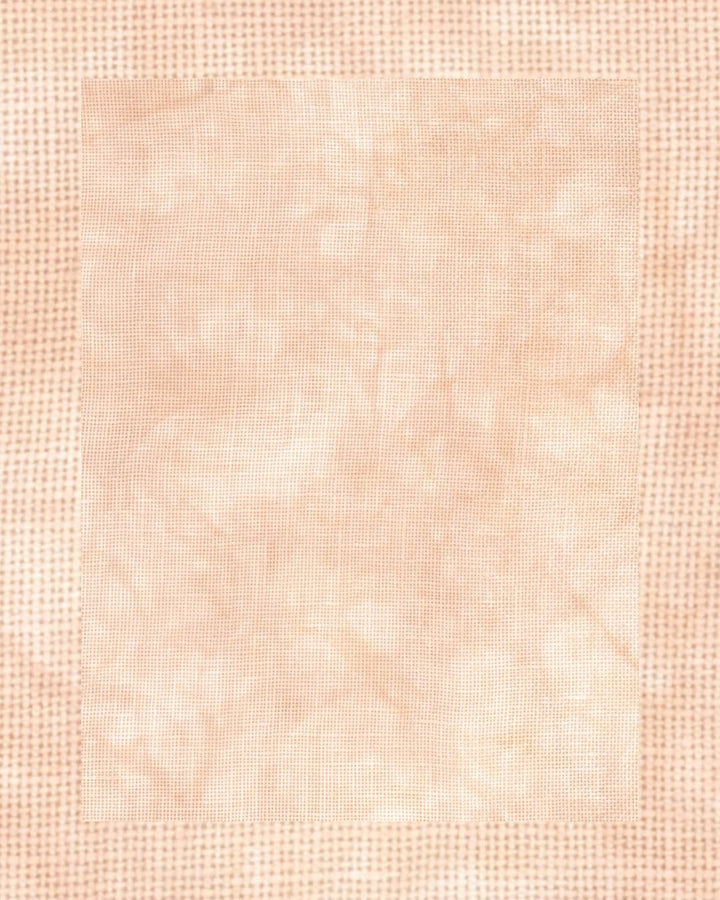 A square fabric swatch with a mottled, marbled pattern in light peach, beige, and soft pink tones, framed by a textured dotted border.