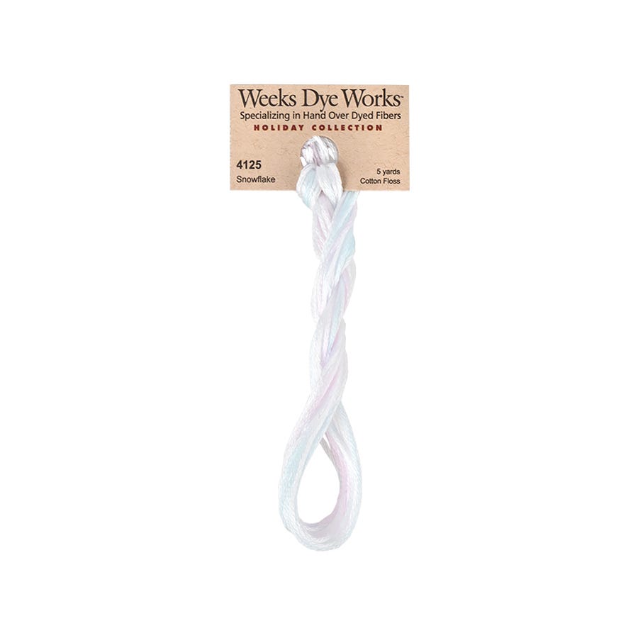 Weeks Dye Works hand-dyed cotton embroidery floss skein in snowflaek an overdyed white floss with hues of light pink and light blue