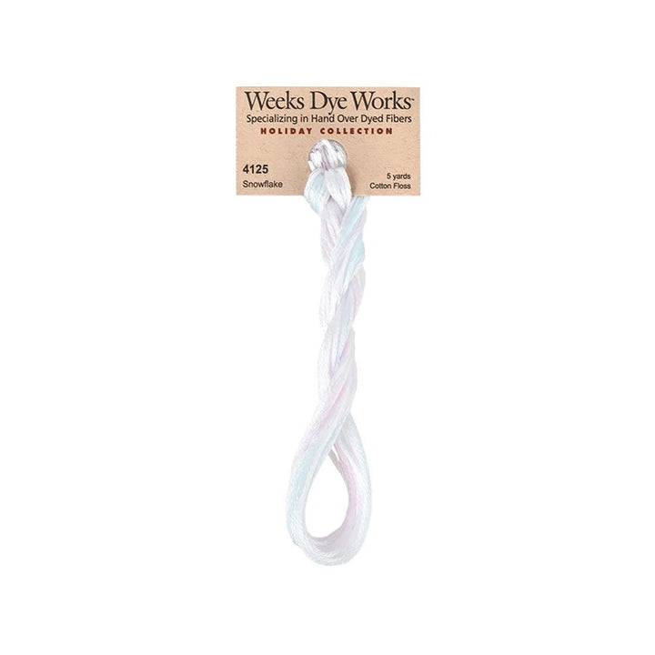 Weeks Dye Works hand-dyed cotton embroidery floss skein in snowflaek an overdyed white floss with hues of light pink and light blue