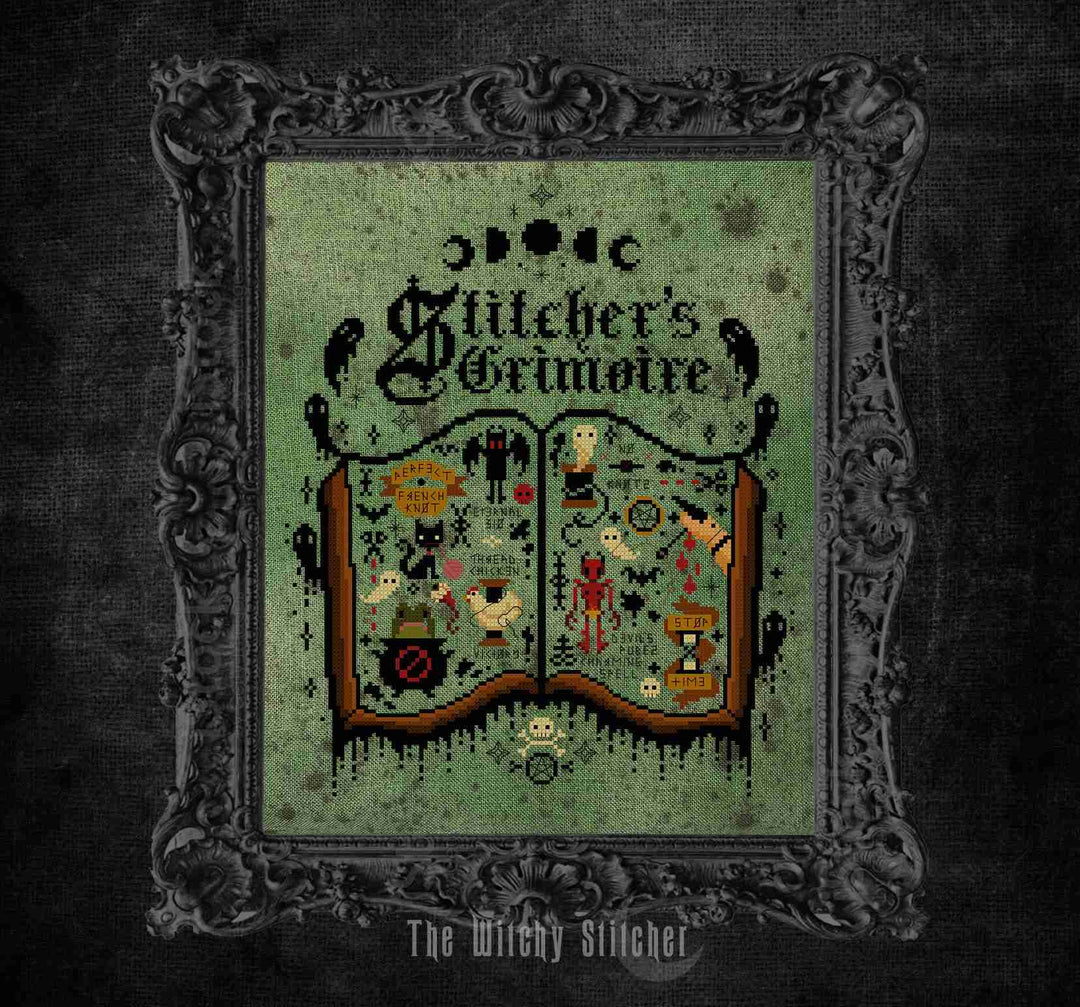 model photo fro The Witchy Stitcher stitcher's grimoire featuring a gothic cross-stitch illustration of an open book with whimsical embroidered motifs on a textured green background, framed by an ornate dark gray frame against a dark textured backdrop.