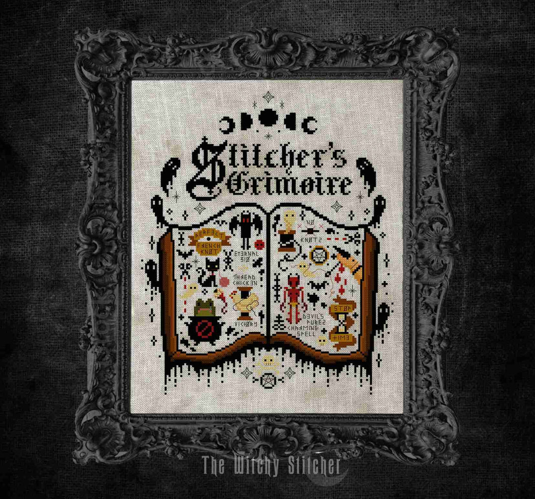 A framed gothic-themed cross-stitch design titled 'Stitcher's Grimoire' on a dark textured background. The central stitched artwork shows an open book filled with witch and fairy motifs, surrounded by black birds and celestial symbols.
